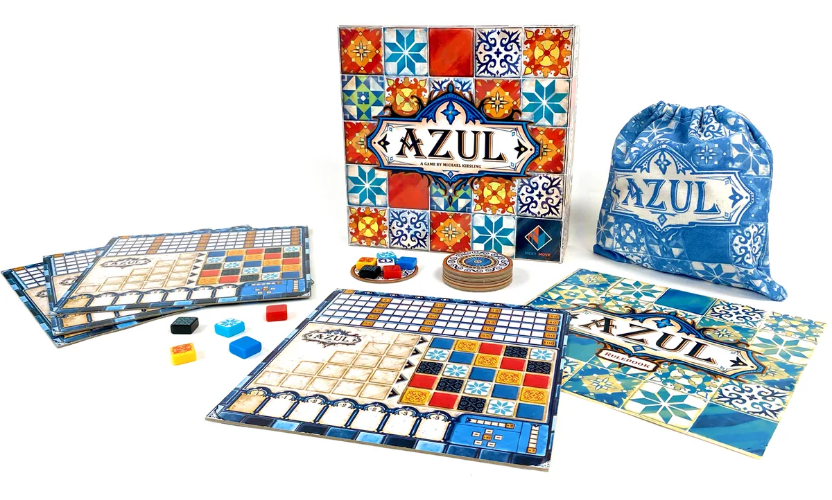 Azul's contents: player boards, factory discs, coloured tiles, the cloth bag and the box
