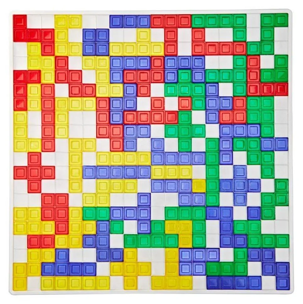 A finished Blokus board seen from above, almost every square filled with coloured pieces