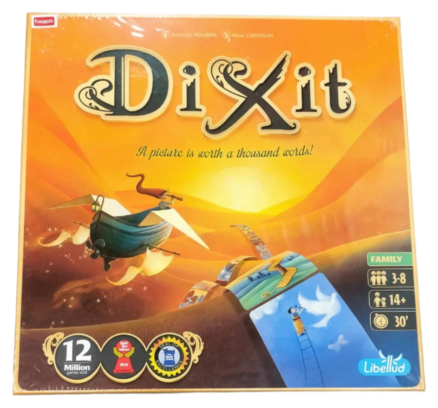 The Funskool Dixit box: a dreamy painting of a flying ship over golden hills, with 3–8 players marked on the side