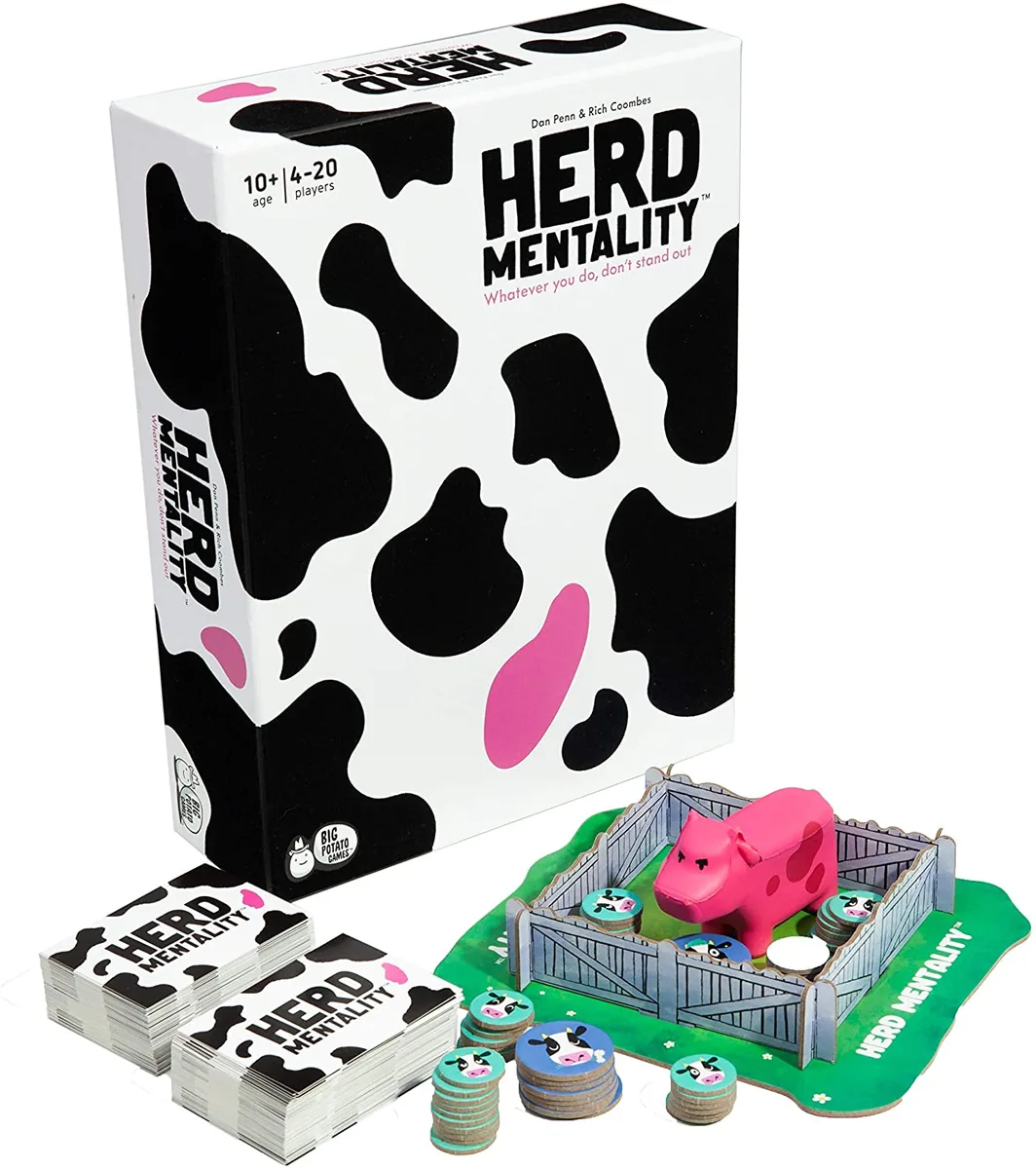 The Herd Mentality box with its question cards, cow tokens, cardboard paddock and the squishy pink cow