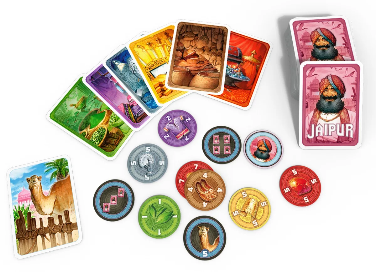Jaipur's contents: goods cards, camel cards and round tokens laid out