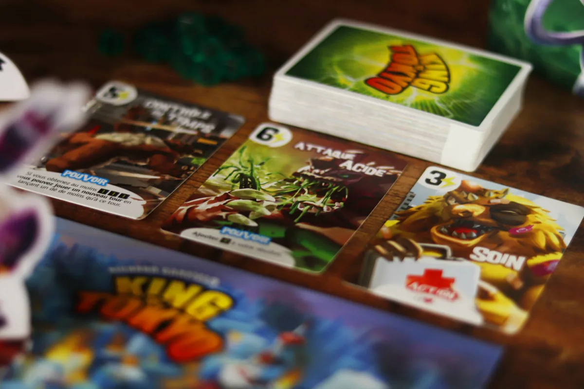 Power cards and a monster board next to the card deck
