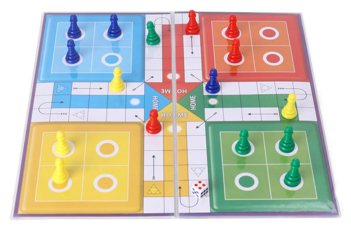 A Ludo board with red, green, yellow and blue counters waiting in their corners