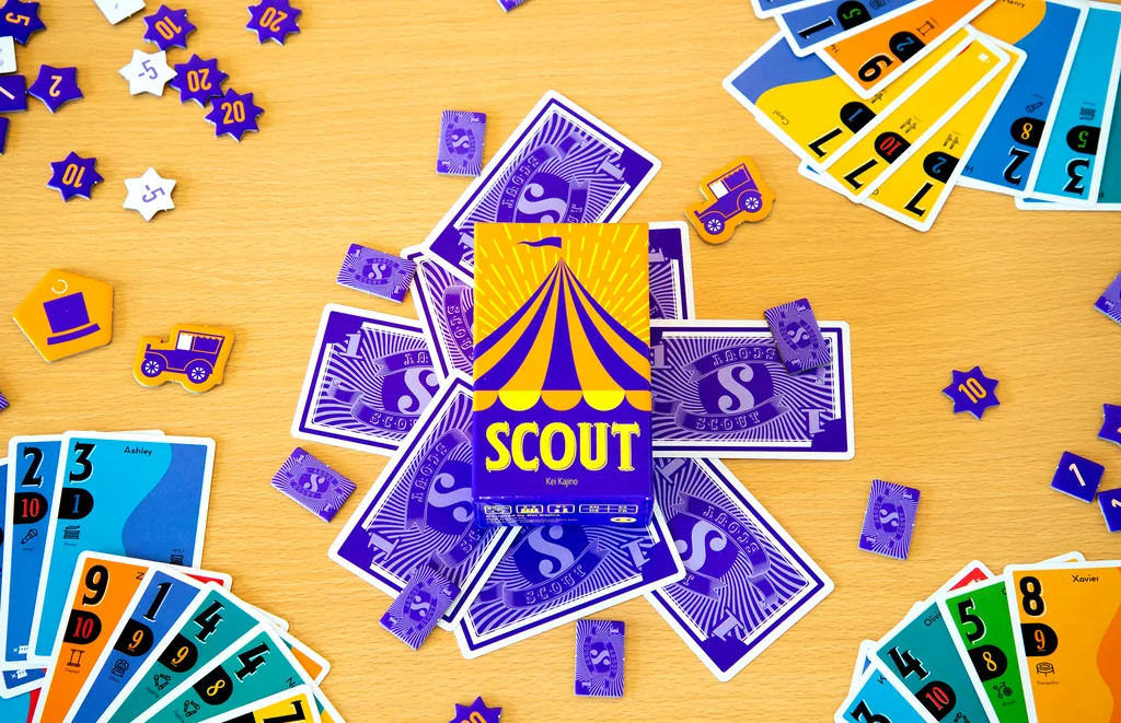 The SCOUT box on a table among cards and chips