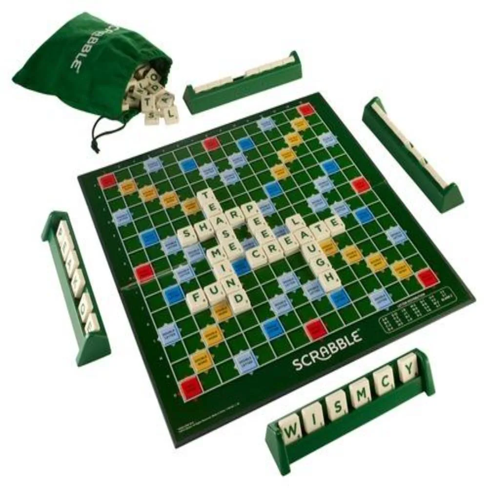 The green Scrabble board with tiles, four tile racks and the cloth letter bag