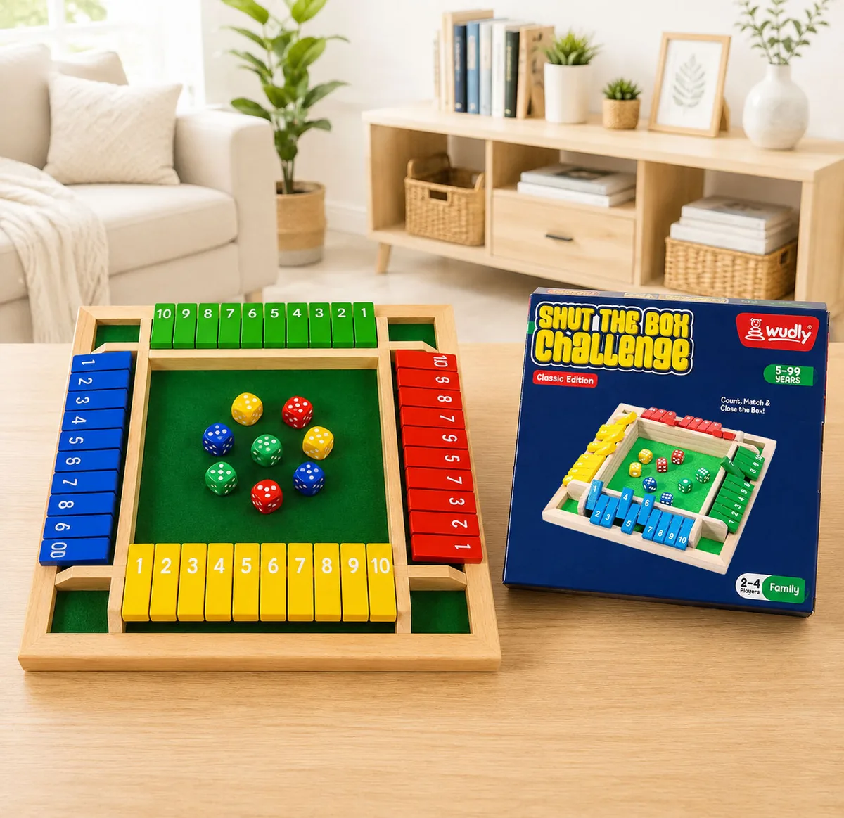 Wudly's four-player Shut the Box on a coffee table beside its box: green felt, coloured number tiles on all four sides and dice