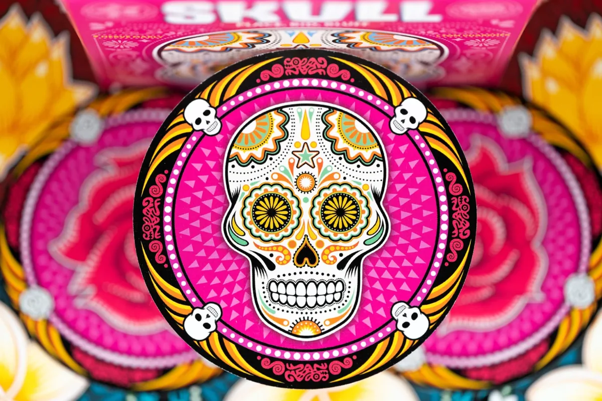 Close-up of a pink sugar-skull disc