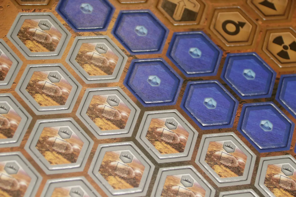 Rows of hexagonal ocean, greenery and city tiles