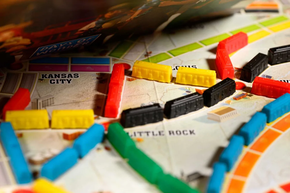 Close-up of plastic trains placed on routes near Kansas City and Little Rock